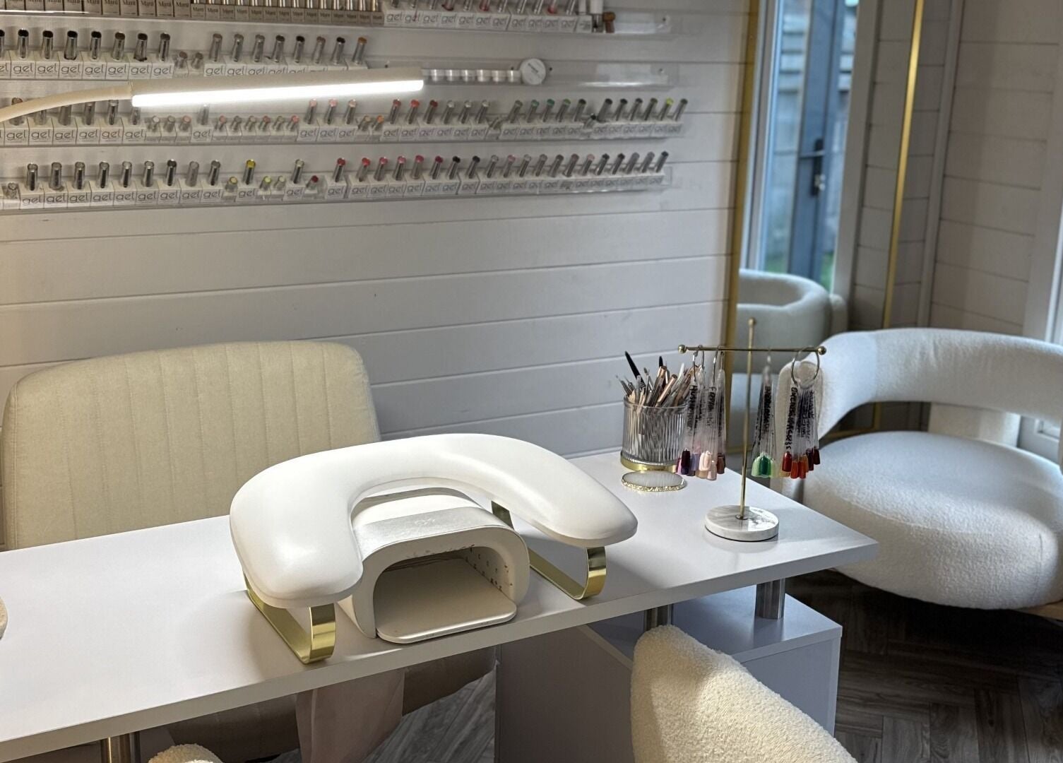 Modern nail studio at Cc Beautè, Cardiff, Wales, GB showcasing a chic manicure setup.