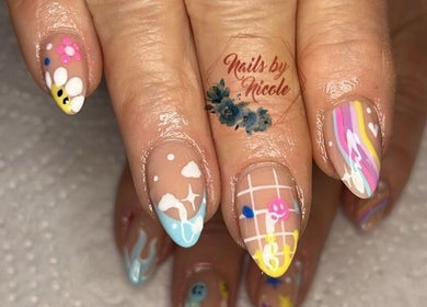 Colorful nail art at Nails By Nicole, Canvey Island, England, GB showcasing intricate designs and vibrant colors.