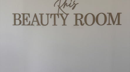 Rhis Beauty Room signage on a wall at Pengam Road, Cymru, GB.