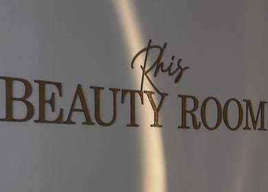 Glistening Rhis Beauty Room sign at Pengam Road, Cymru, GB capturing elegance and style.
