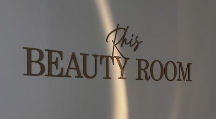 Glistening Rhis Beauty Room sign at Pengam Road, Cymru, GB capturing elegance and style.