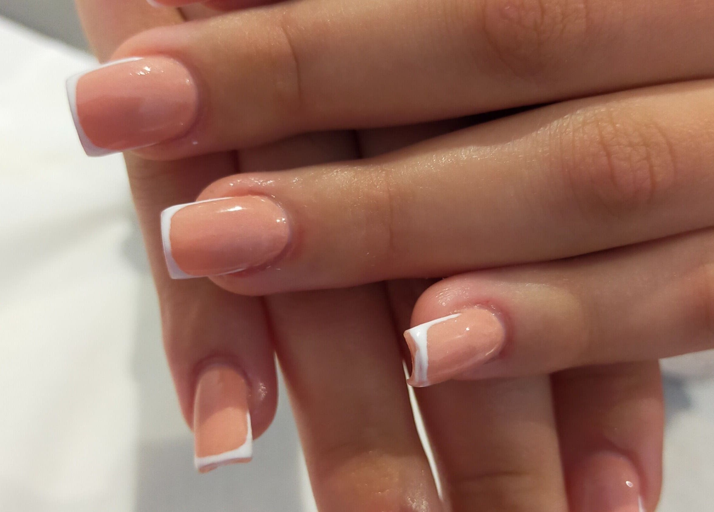 Elegant French manicure nails at HD Beauty Parlor, Cape Town, Western Cape, ZA.