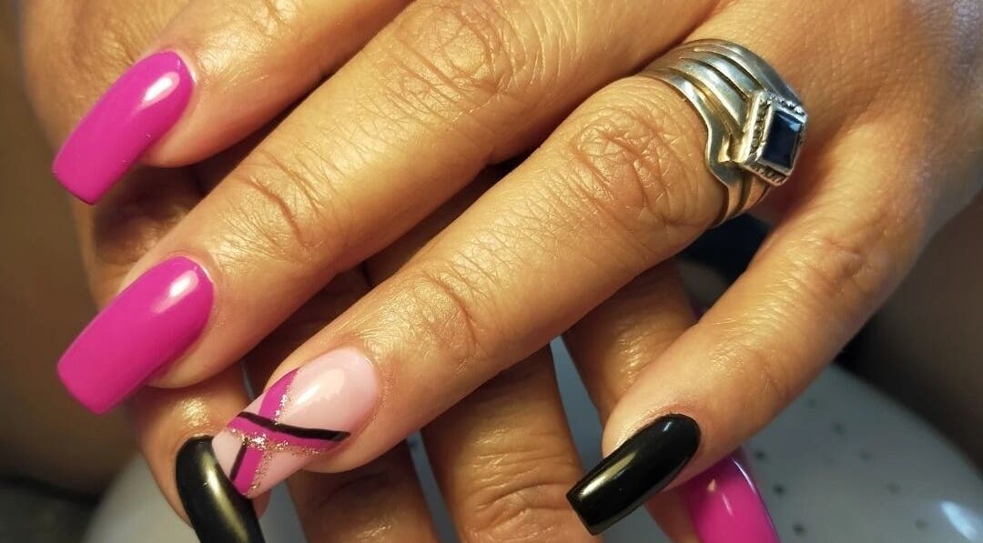 Vibrant nail art at HD Beauty Parlor, Cape Town, Western Cape, ZA enhances elegance and style.