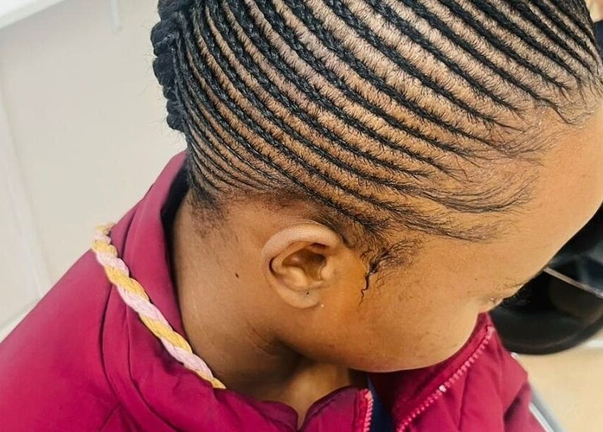 Stylish cornrow braids at HD Beauty Parlor, Cape Town, Western Cape, ZA, showcasing expert hairstyling.