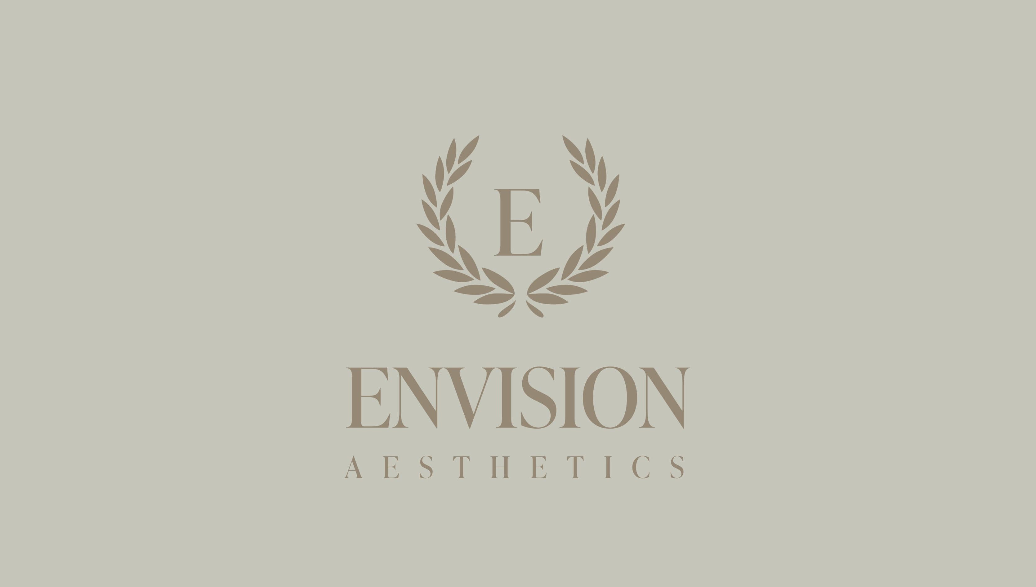 Logo of Envision Aesthetics, Galashiels, Scotland, GB; featuring elegant laurel wreath design.