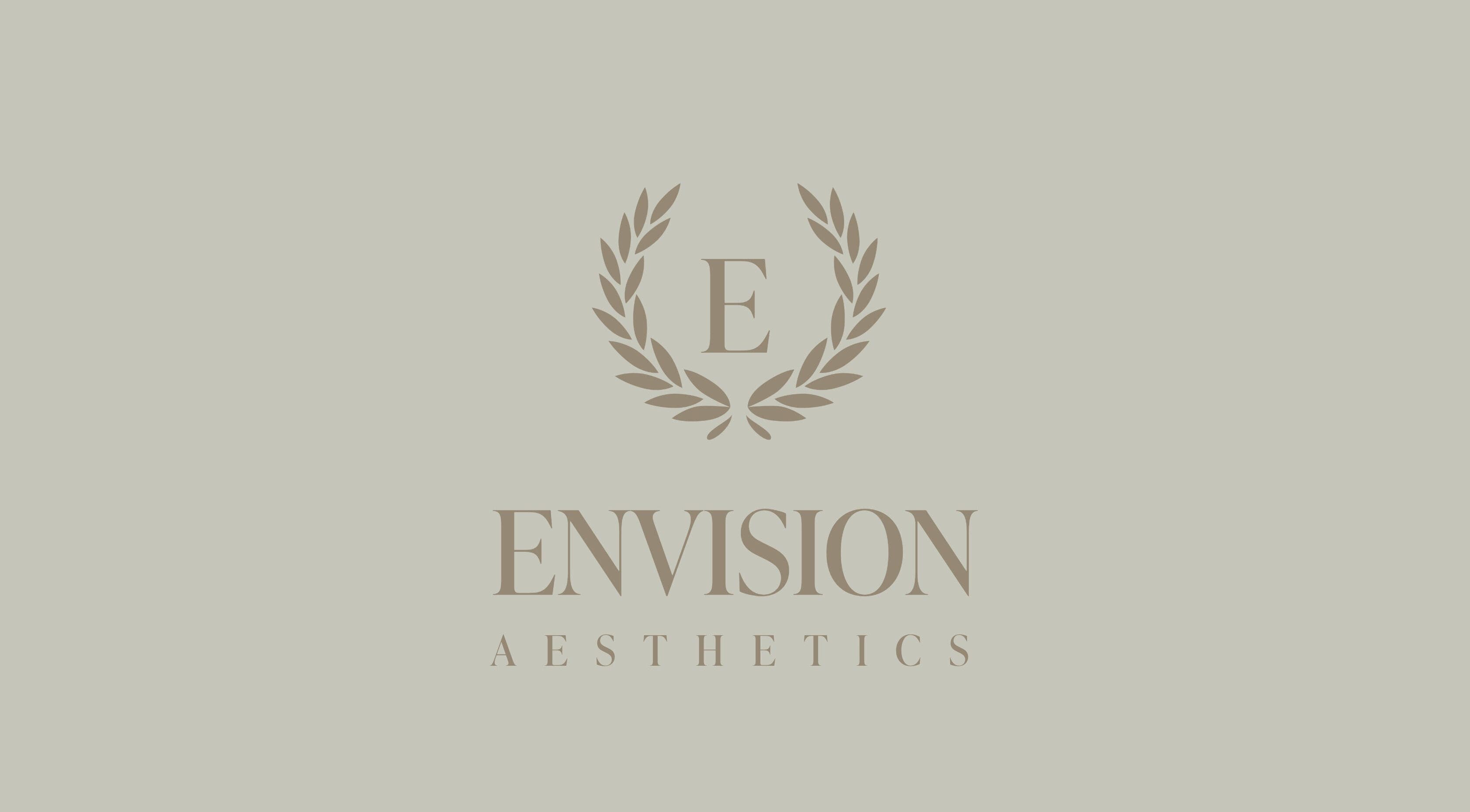 Envision Aesthetics logo featuring leaves, located in Galashiels, Scotland, GB. Modern and serene.