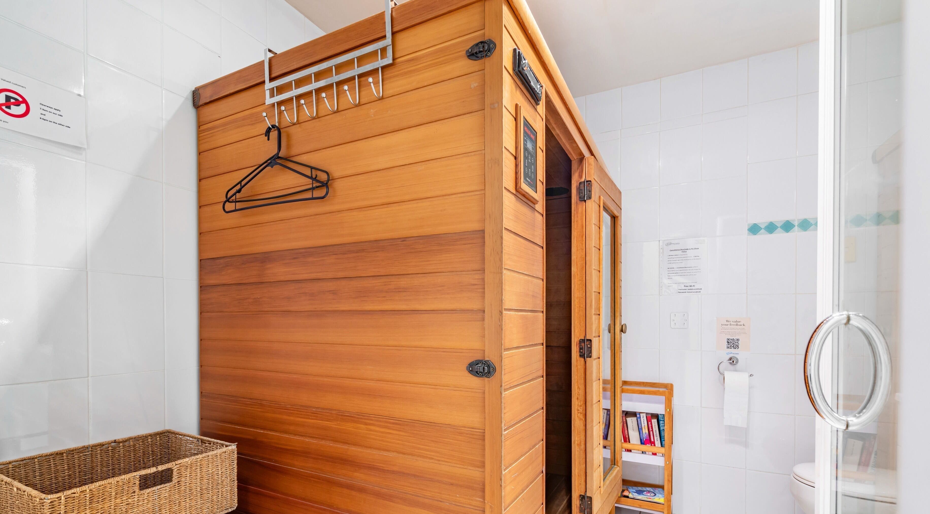 Wooden sauna room at Colon Care Centre, Auckland, Auckland, NZ, offering a tranquil wellness experience.