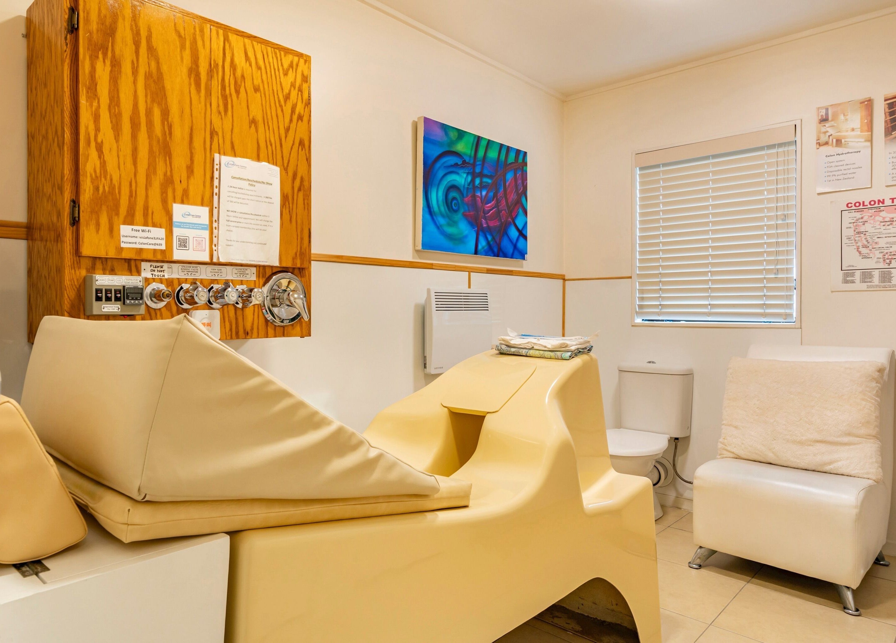 Colon Care Centre's therapy room in Auckland, NZ, showcasing modern equipment and serene ambiance.