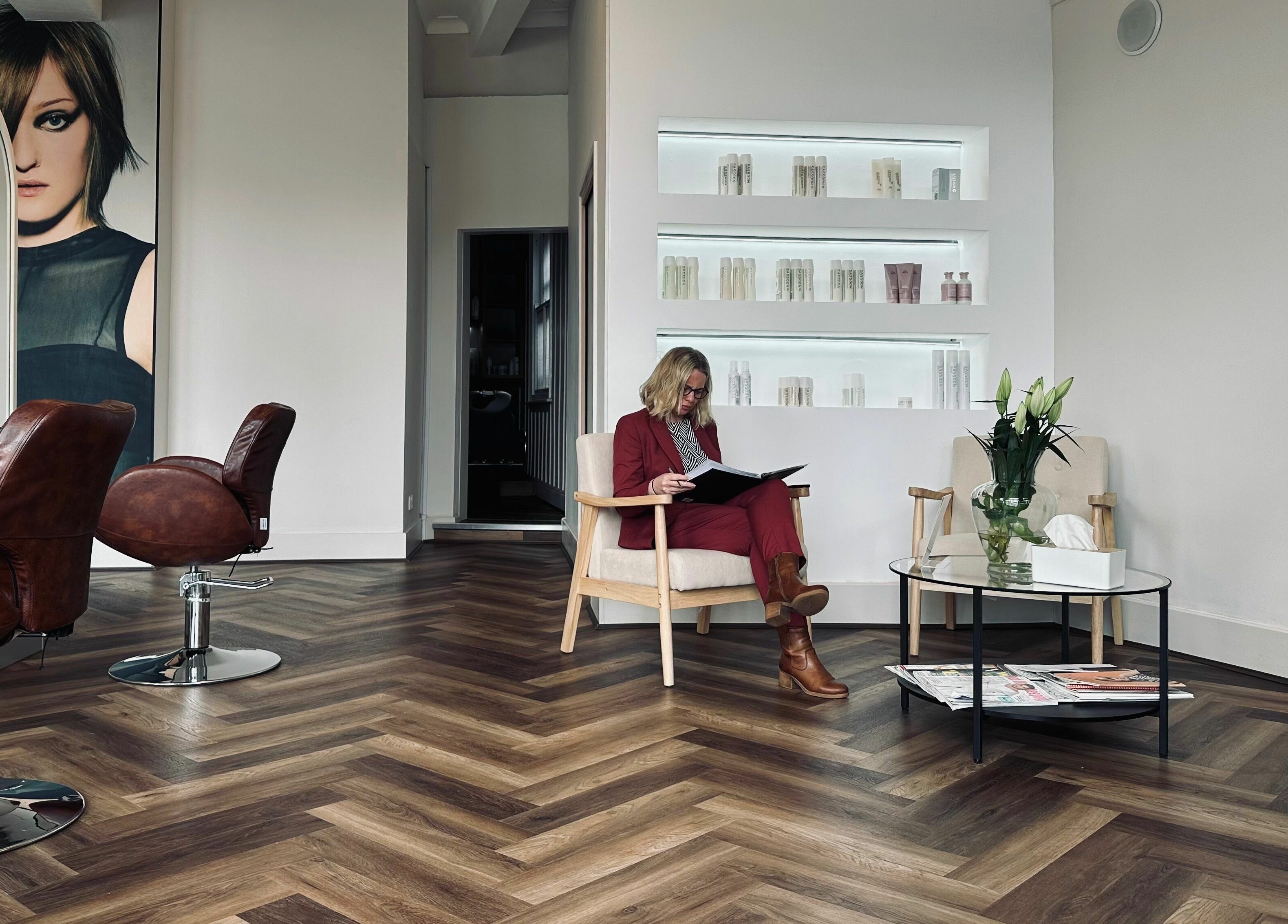 Modern salon interior at Nathan Richardson Hair in Sheffield, England, GB with sleek design and comfortable seating.