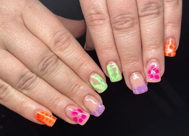 Vibrant nail art at Cw Artistry in Glasgow, Scotland, GB showcasing colorful and creative designs.