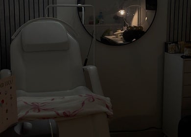 Cw Artistry spa room with comfortable chair and calming decor in Glasgow, Scotland, GB.
