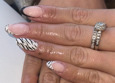 Stylish zebra nail art manicure at Cw Artistry, Glasgow, Scotland, GB.