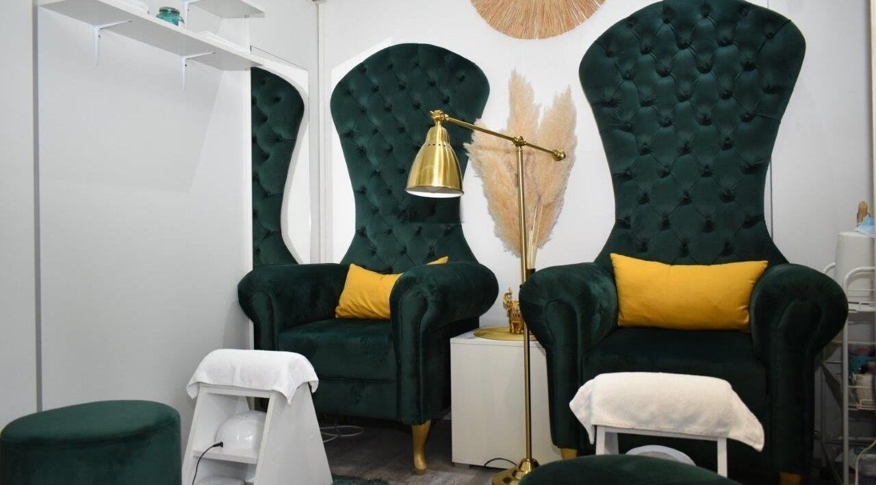 Luxurious seating area at Kalisi, Београд, RS offers plush comforts for beauty treatments.