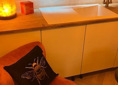 Cozy seating and warm glow lamp at Wellness at Happy Buddha in Poole, England, GB.