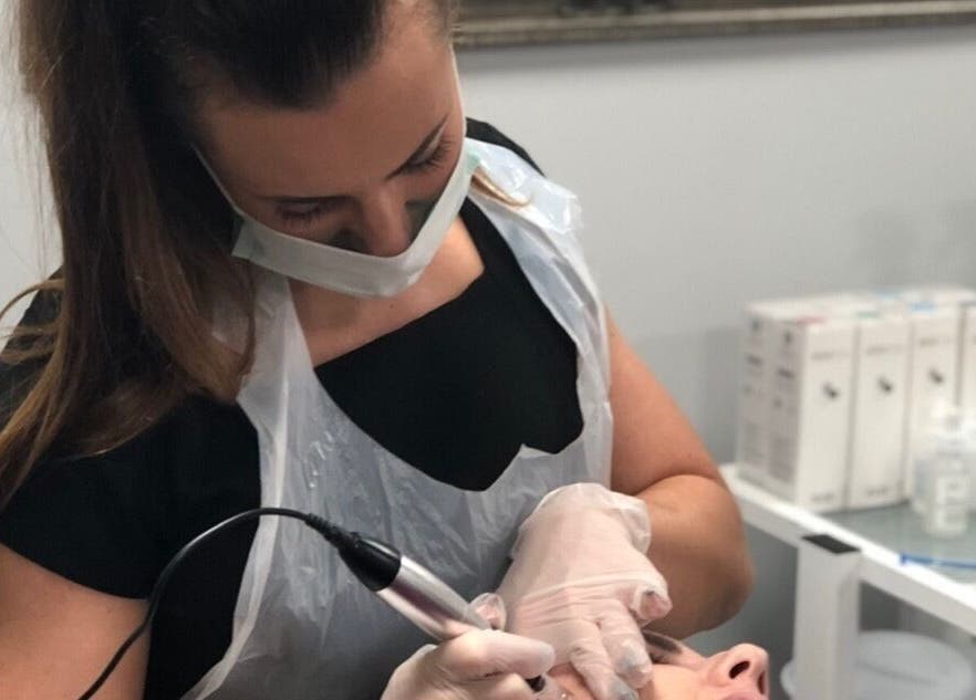 Skilled professional providing treatment at Unique Beauty and Aesthetics in Chorley, England, GB.