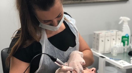 Skilled professional providing treatment at Unique Beauty and Aesthetics in Chorley, England, GB.