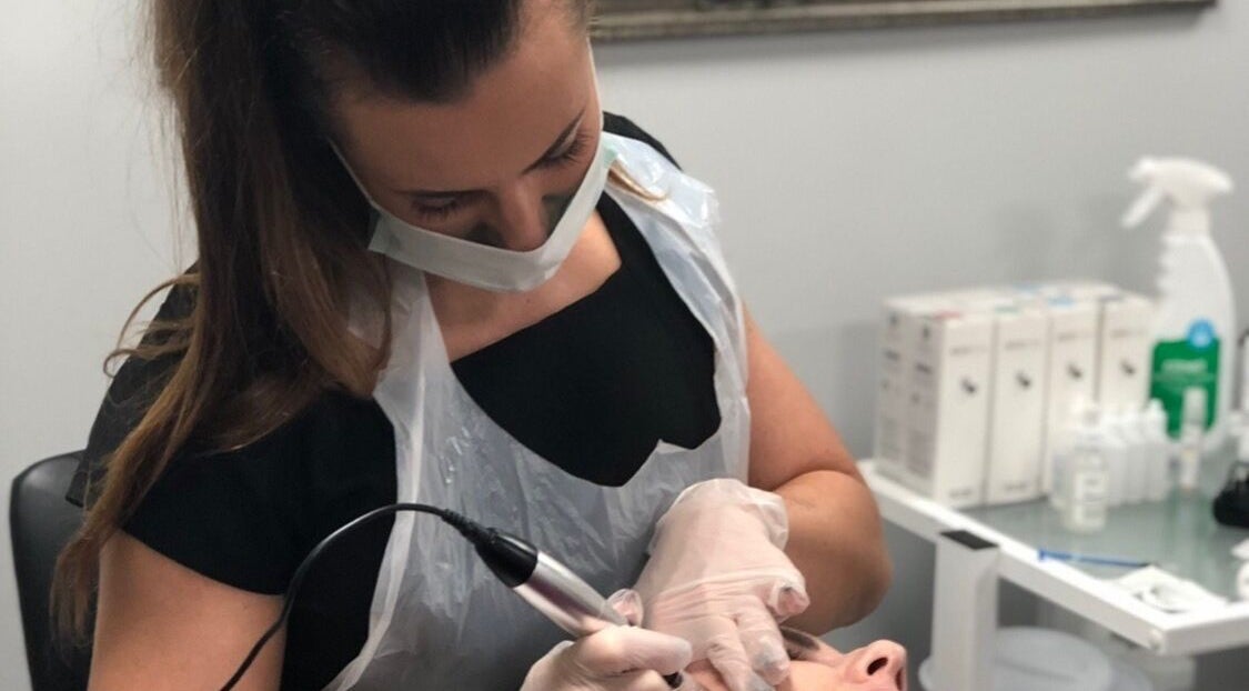 Skilled professional providing treatment at Unique Beauty and Aesthetics in Chorley, England, GB.