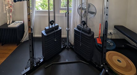 Strength training area at YourPT @ BestU Body Lab, Melbourne, Victoria, AU with weight stacks.