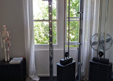 YourPT @ BestU Body Lab, Melbourne, Victoria, AU: fitness equipment and anatomical model in bright room.