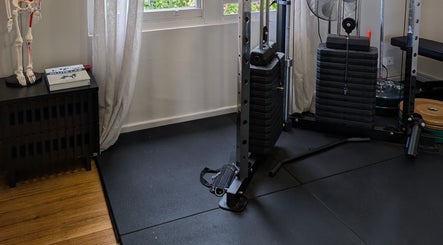 Well-equipped gym corner at YourPT @ BestU Body Lab in Melbourne, Victoria, AU showcasing diverse workout equipment.