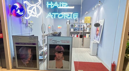 Bright Hair Atorie salon in Singapore, SG showcasing awards and modern interior decor.