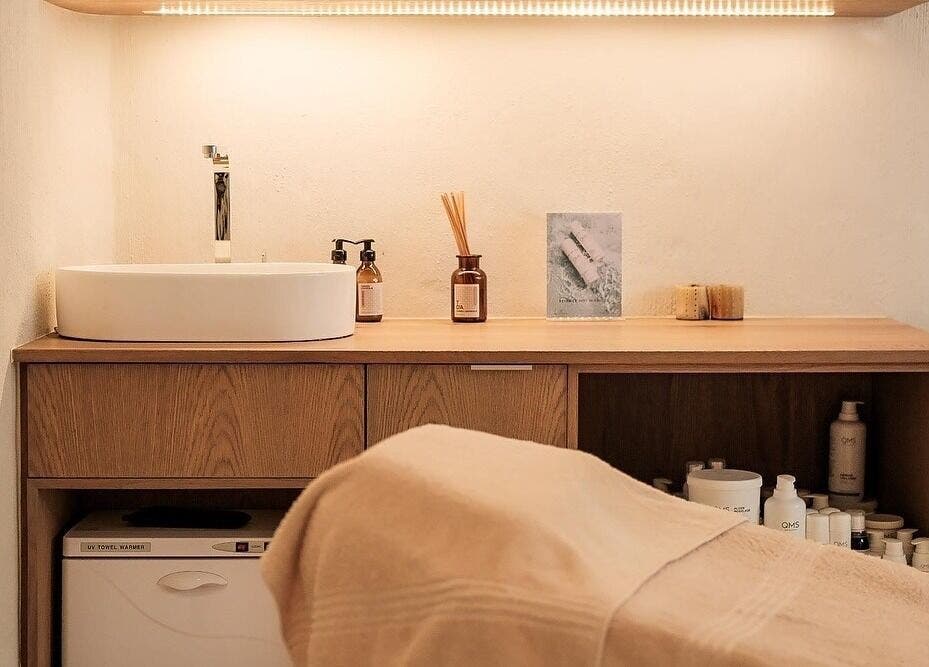 Elegant treatment area at Sala Beach Spa, Dolphin Coast, KwaZulu-Natal, ZA featuring a sink and essential oils.