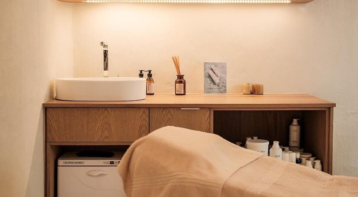 Elegant treatment area at Sala Beach Spa, Dolphin Coast, KwaZulu-Natal, ZA featuring a sink and essential oils.