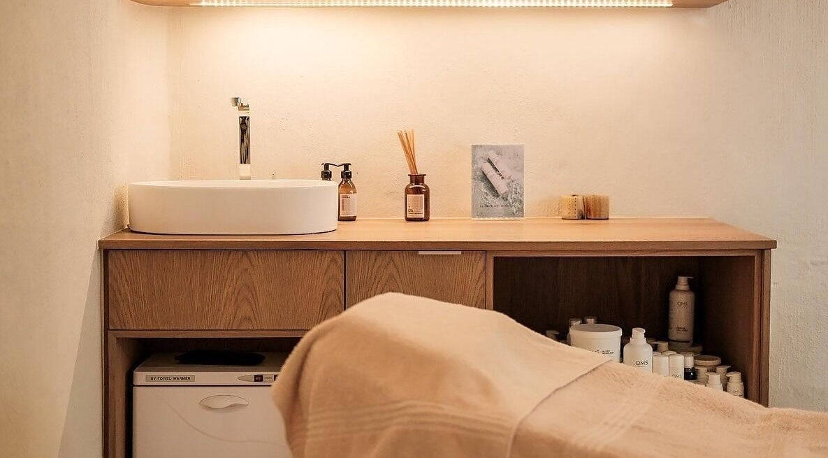 Elegant treatment area at Sala Beach Spa, Dolphin Coast, KwaZulu-Natal, ZA featuring a sink and essential oils.