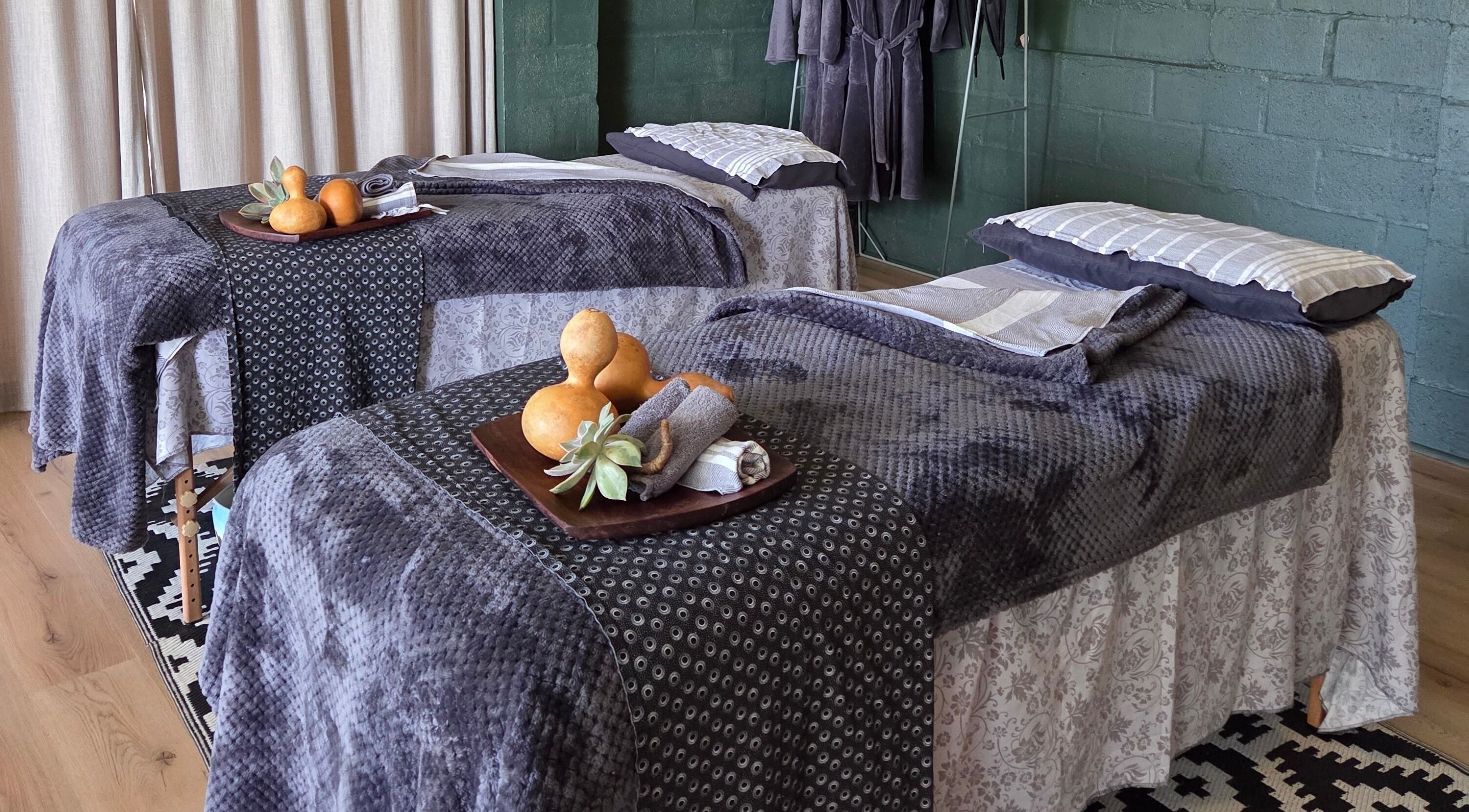 Relaxing treatment tables at Touch by Africa Nitida in Cape Town, Western Cape, ZA, ready for a calming session.