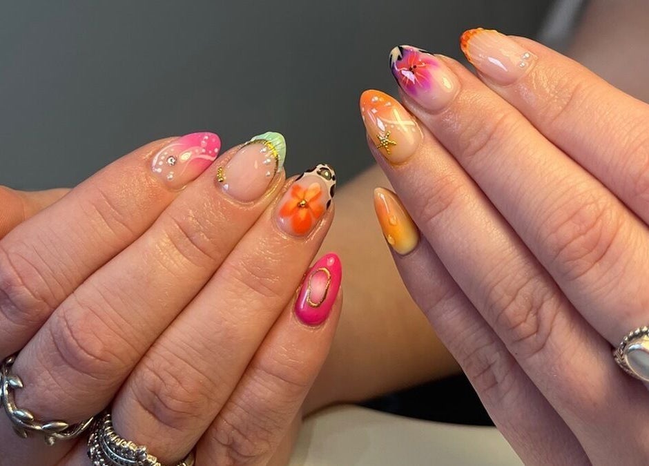 Colorful nail designs at Beauty by Hannah in Willenhall, England, GB, showcasing intricate artistic styles.
