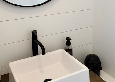 Modern washbasin at RèFINE Boutique Salon in Morton Grove, Illinois, US showcasing sleek design.