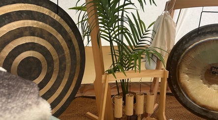 Relaxing gongs and green plants at The Soul's Whisper - Massage, Reiki & Sound Healing, Gloucester, England, GB.