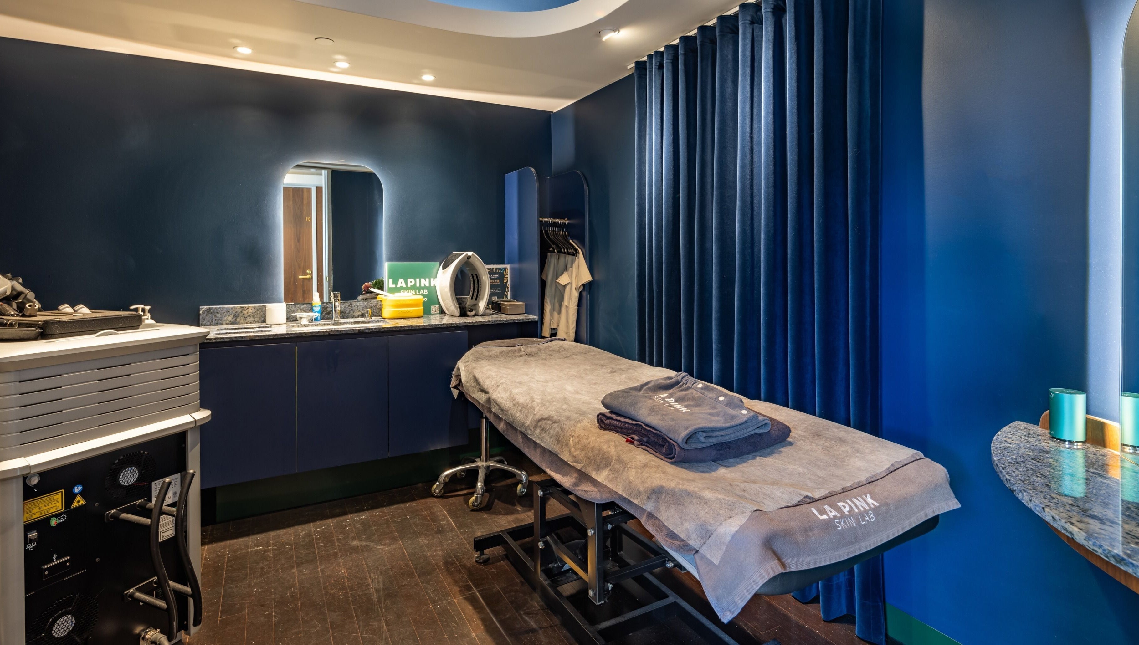 Lapink Skin Lab's serene treatment room with plush bed in Barangaroo, New South Wales, AU.