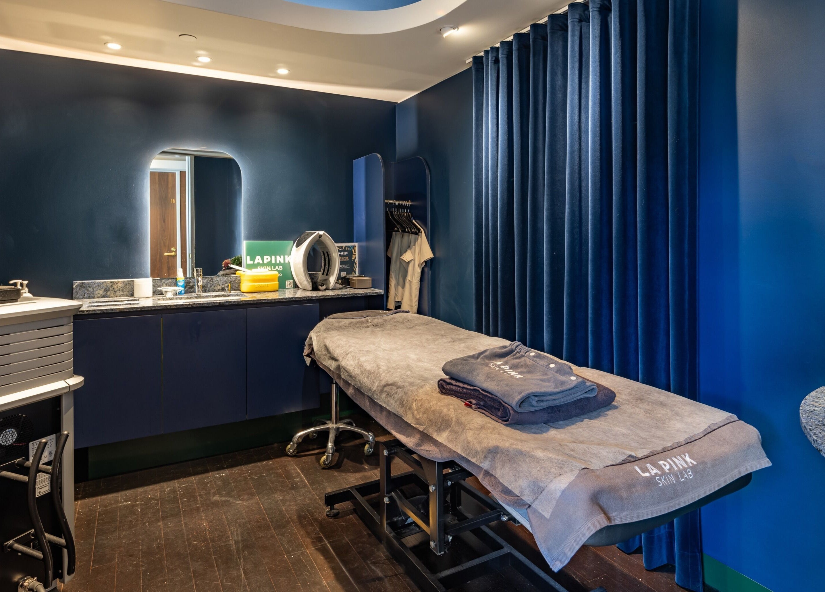 Lapink Skin Lab's serene treatment room with plush bed in Barangaroo, New South Wales, AU.