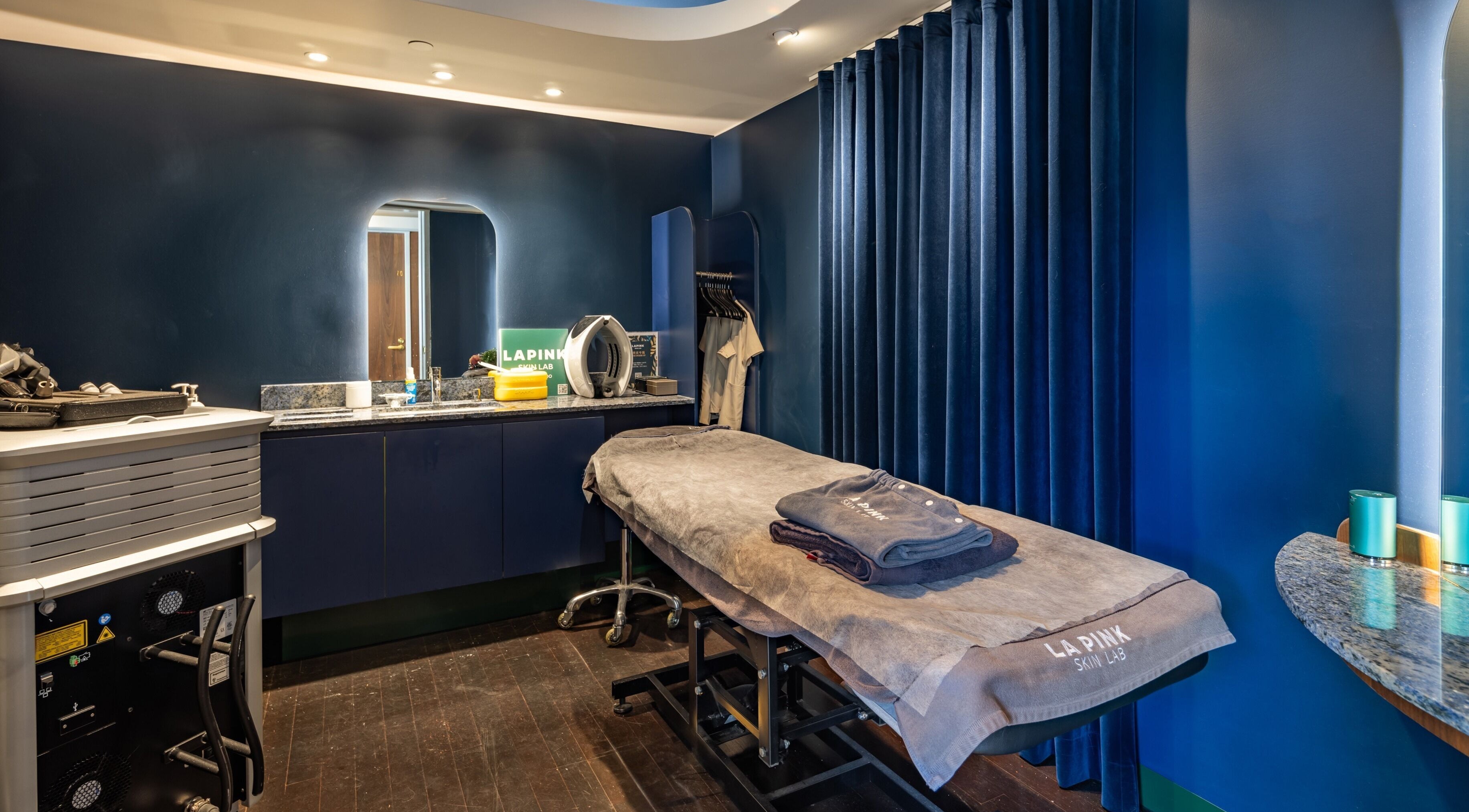 Lapink Skin Lab's serene treatment room with plush bed in Barangaroo, New South Wales, AU.