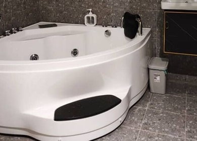 Elegant jacuzzi at Awa Salon and Spa, Tumpat, Kelantan, MY, offering relaxation and luxury.