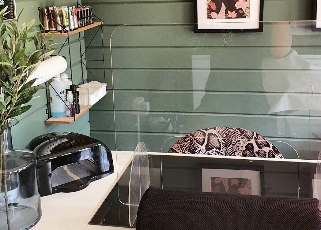 Chic salon table at Beauty by Taisiya, Burton Upon Trent, England, GB with greenery and product display.