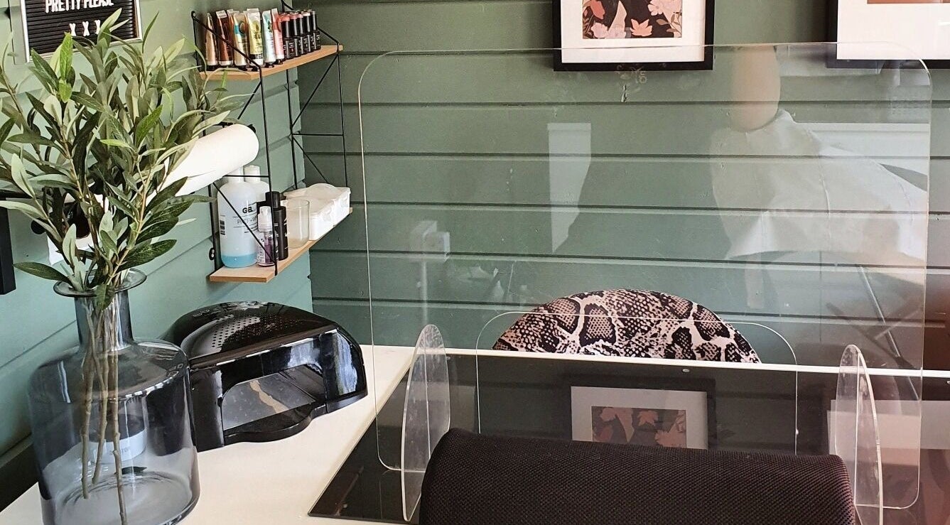 Chic salon table at Beauty by Taisiya, Burton Upon Trent, England, GB with greenery and product display.