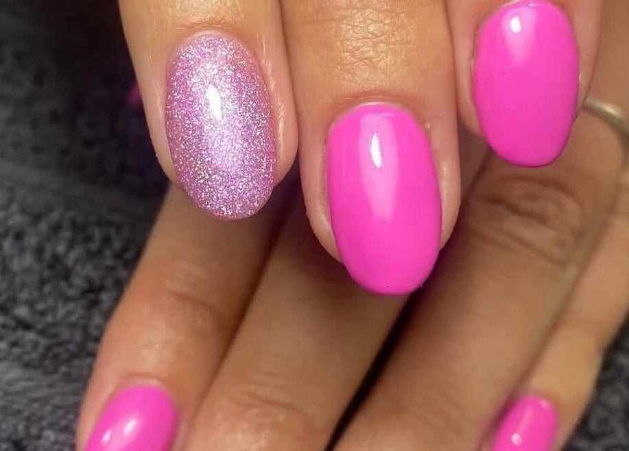 Pink and glitter nails at House of B, Caistor, England, GB. Perfect for elegant flair.