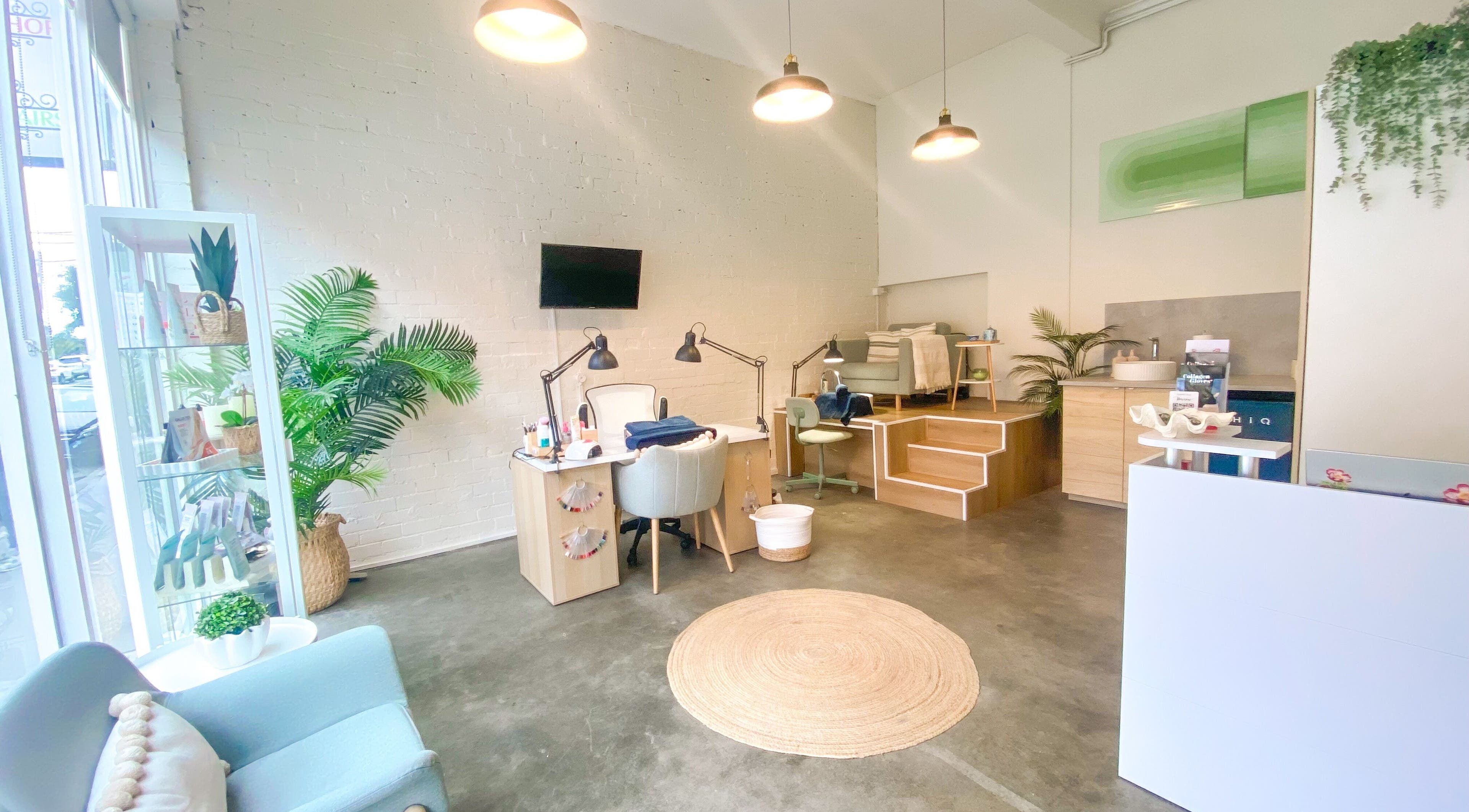 Tranquil interior of The Nail Assembly in Melbourne, Victoria, AU, featuring modern decor and manicure stations.
