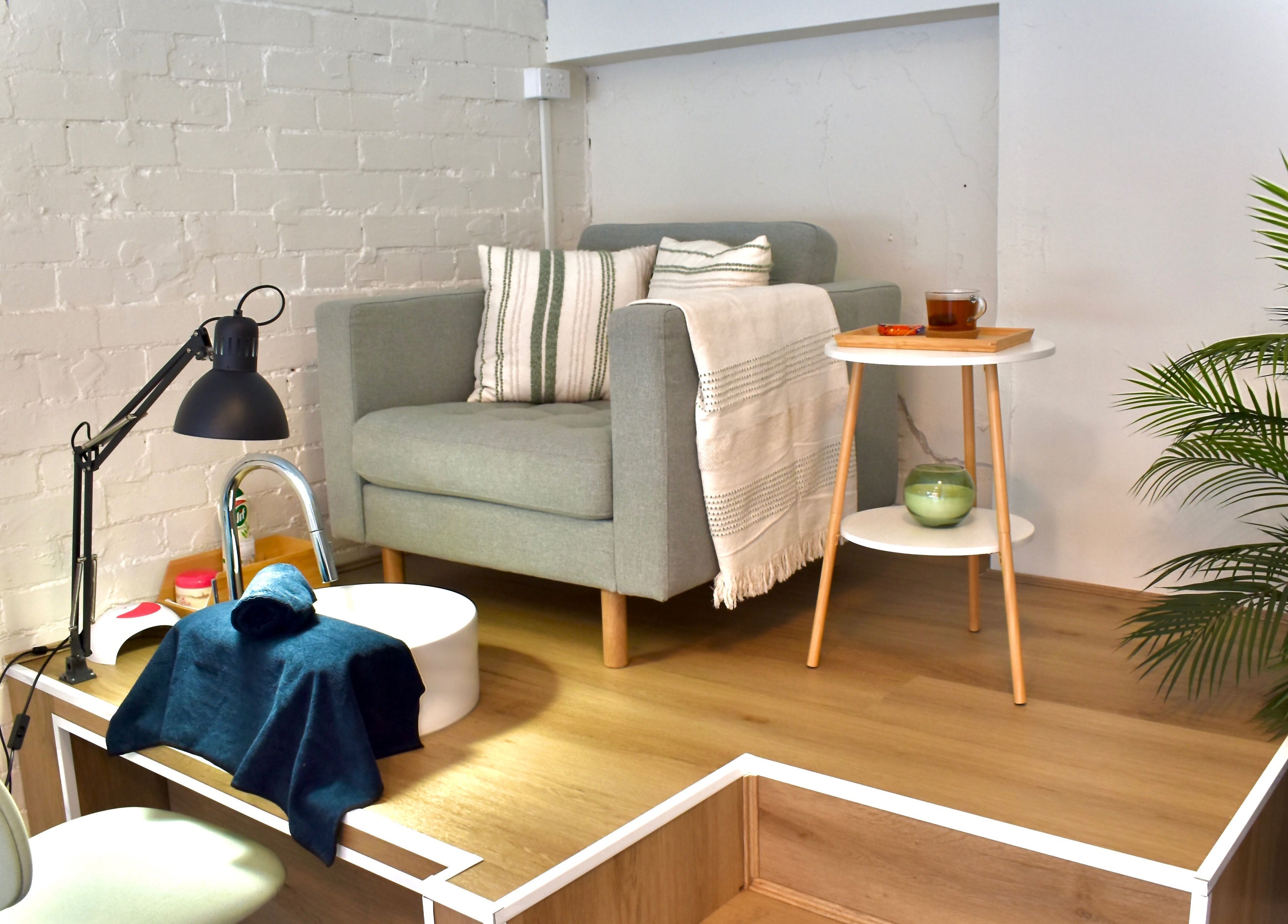 Comfortable nail station at The Nail Assembly, Melbourne, Victoria, AU with cozy chair and stylish decor.