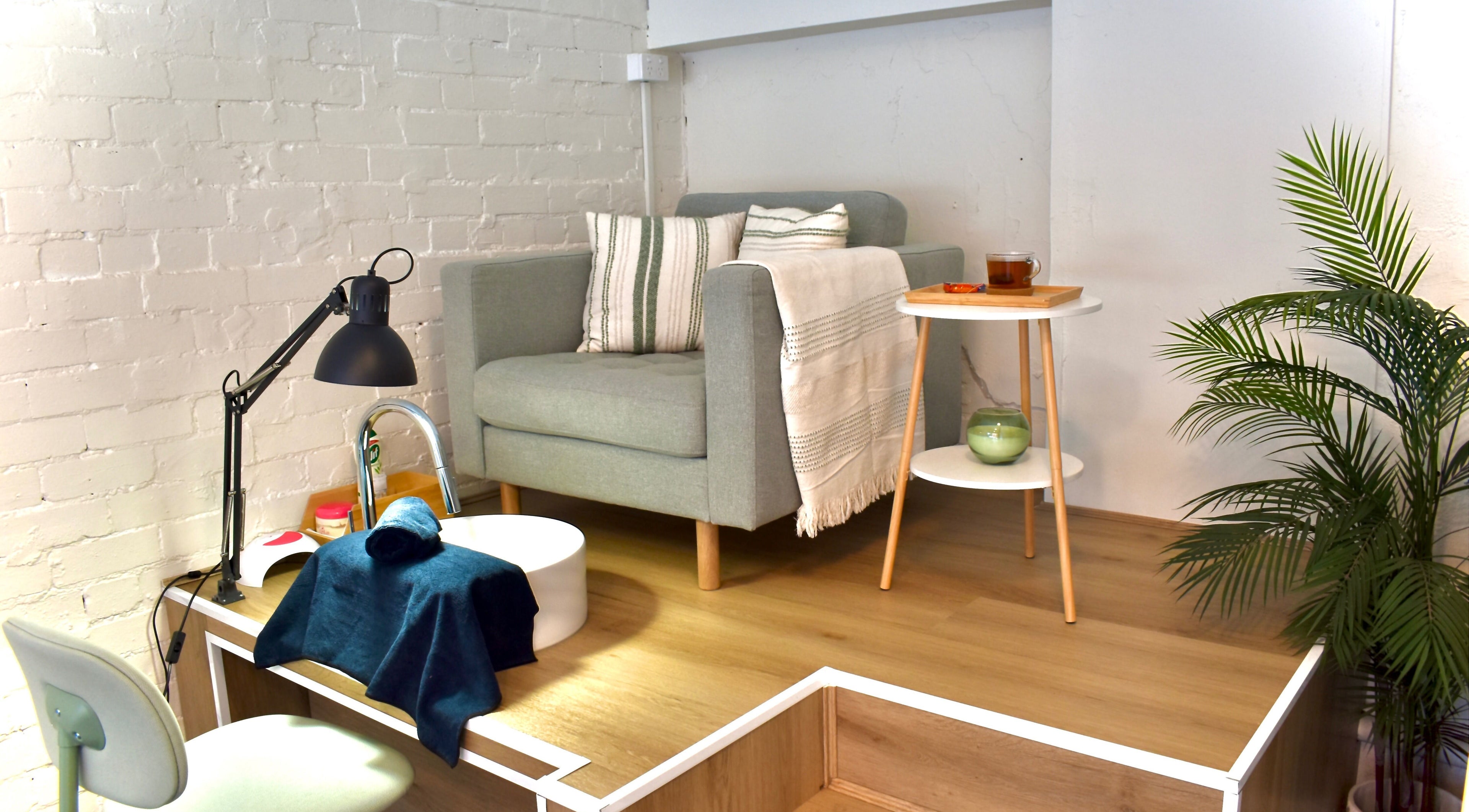 Comfortable nail station at The Nail Assembly, Melbourne, Victoria, AU with cozy chair and stylish decor.