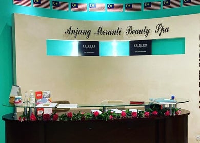 Reception at Anjung Meranti Beauty Spa in Seremban, Negeri Sembilan, MY with floral decor and welcoming signage.