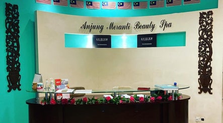 Reception at Anjung Meranti Beauty Spa in Seremban, Negeri Sembilan, MY with floral decor and welcoming signage.