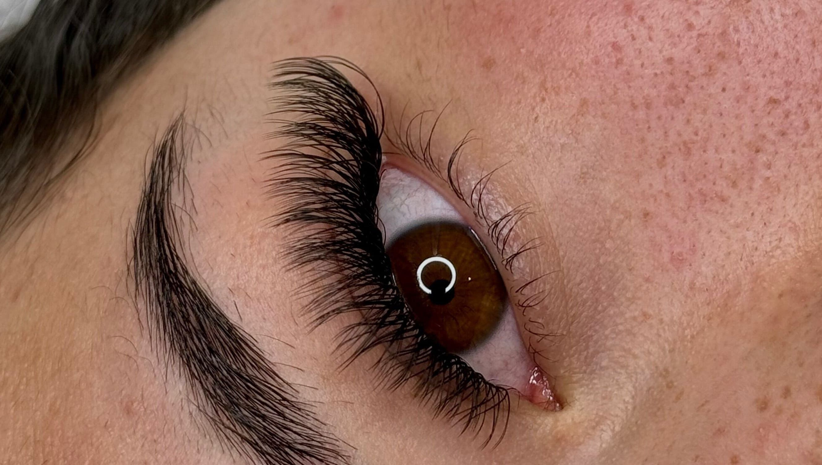 Close-up of expertly applied lashes at CM Lash, Christchurch, Canterbury, NZ, showcasing natural beauty.