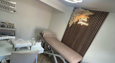 Calming treatment room at Beauty By Christina, By Brechin, Scotland, GB with a plush bed and decor.