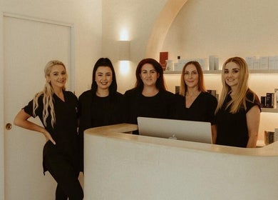 Team at Spring Spa Skin & Beauty in Burleigh Waters, Queensland, AU in a stylish reception area.