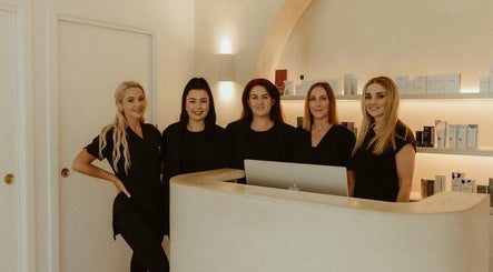 Team at Spring Spa Skin & Beauty in Burleigh Waters, Queensland, AU in a stylish reception area.