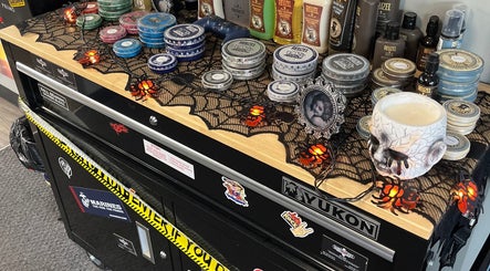 Halloween-themed barber tools display at Barber’s Choice Studio in Oakdale, Minnesota, US.