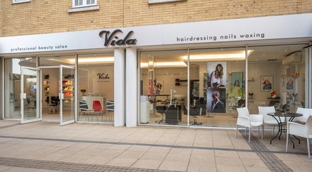 Vida hair & beauty The Brewery in Romford, England, GB showcasing elegant salon front and patio seating.